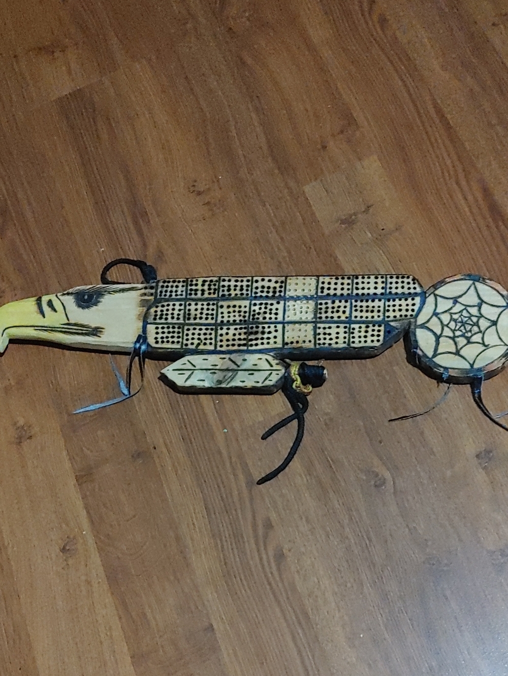 Handcrafted Wooden Eagle Crib Board with Natural Brown and Black Accents